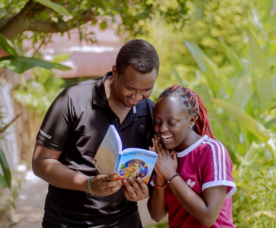 Readers with WSA Rwanda books
